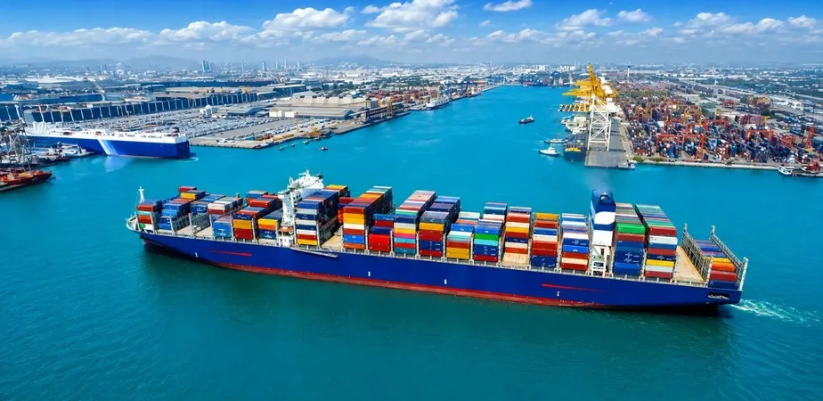 Container ship transporting cargo across international waters as part of a global sourcing and supply chain network.