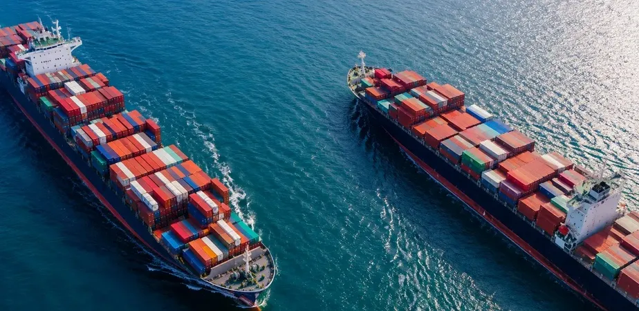 Container ship transporting cargo across international waters as part of a global sourcing and supply chain network.