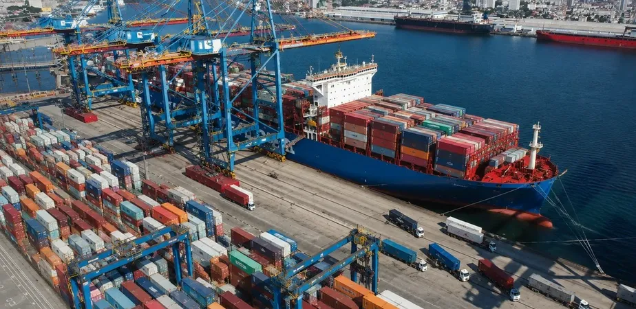 Container ship transporting cargo across international waters as part of a global sourcing and supply chain network.