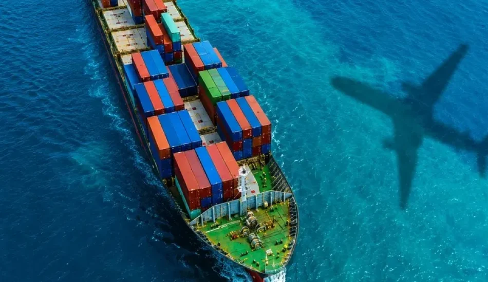 Cargo ship loaded with containers departing an international seaport.